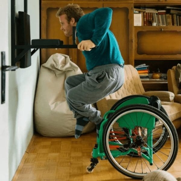 exercising man in wheelchair