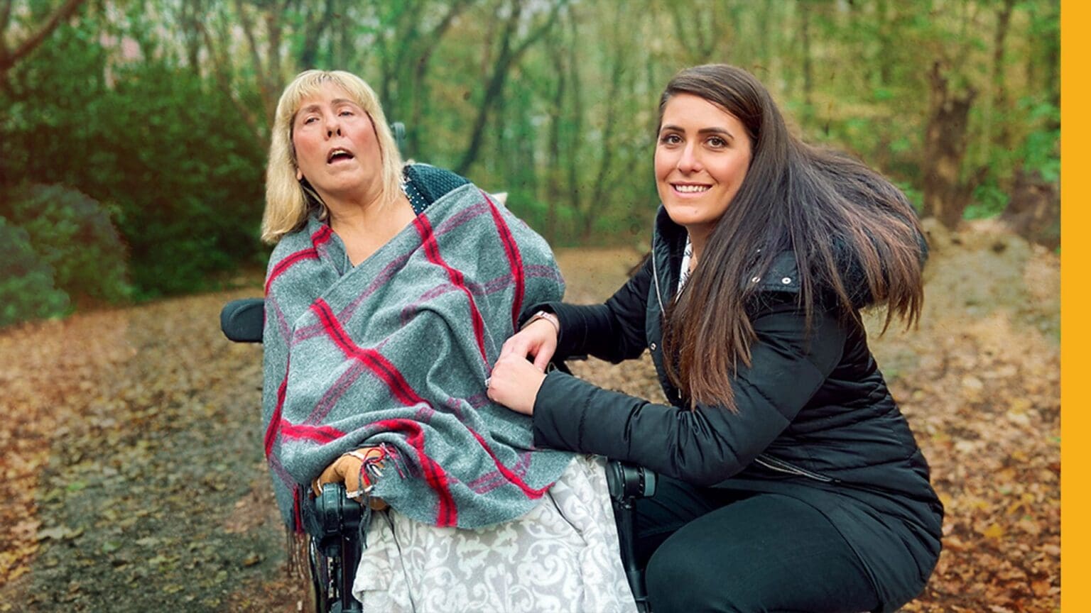Two women one in wheelchair