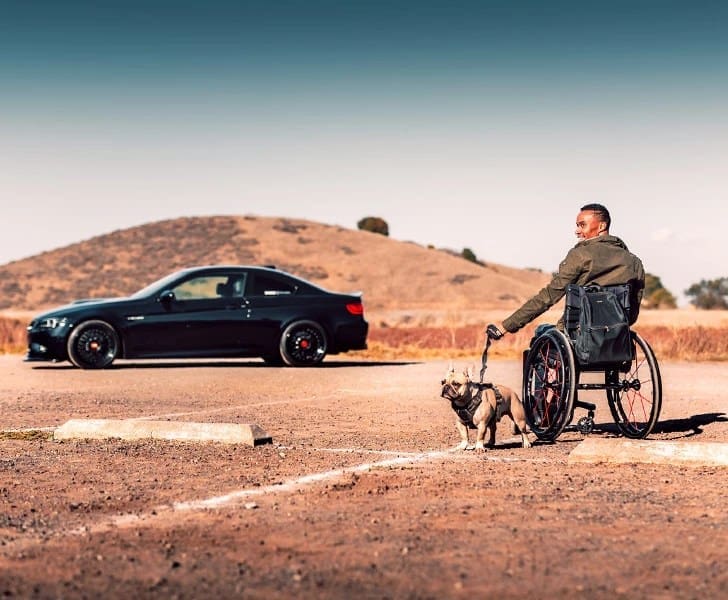 Man in wheelchair with dog