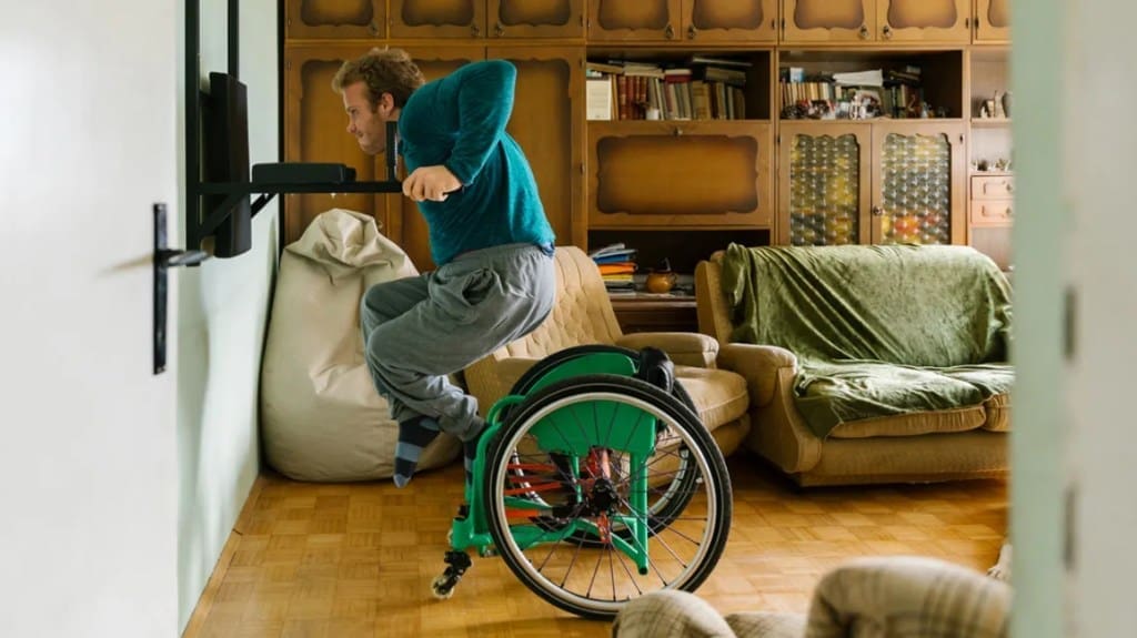 wheel chaired man does dips 1296x728 header